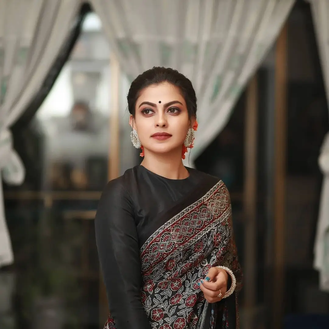 Anusree Nair Wearing Beautiful Earrings Jewellery Black Saree Blouse